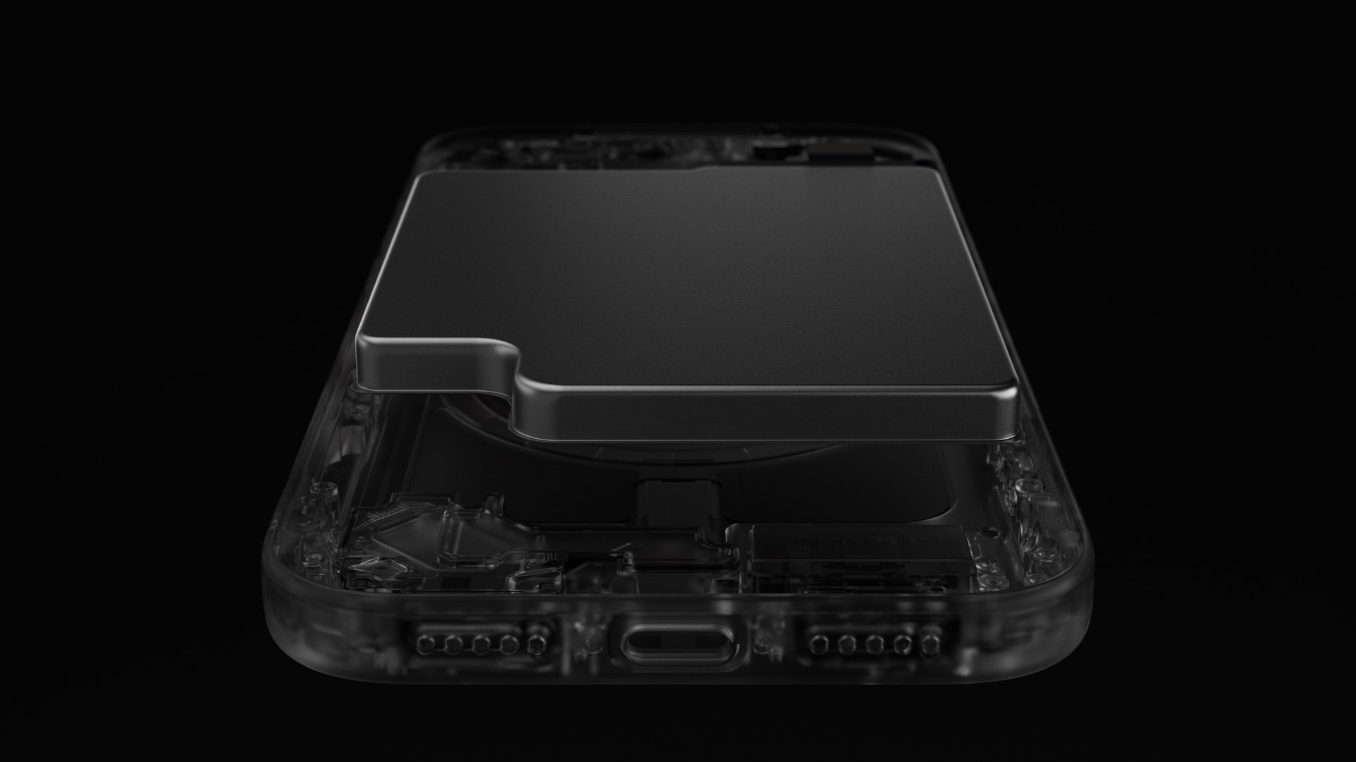 ภาพโครงสร้างภายใน iPhone จากด้านพอร์ต USB-C พร้อมชิ้นส่วนขนาดใหญ่ยกเหนือภายในตัวเครื่อง